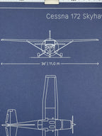 Close-up of Cessna 172 Skyhawk blueprint showing front view with 36 ft wingspan, white ink on navy paper